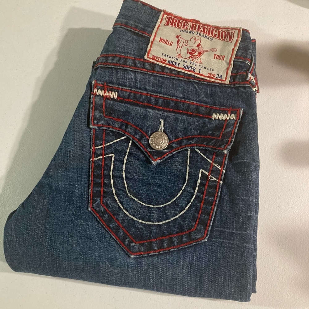 SOLD! Red Stitched Ricky SuperT’s True Religion Size 32x30 as seen on “SEMATARY”